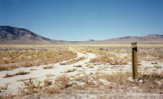 Photograph of pass and trail marker